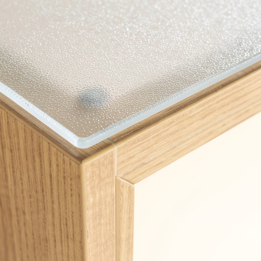 Terrazzo top on a wooden base unit.